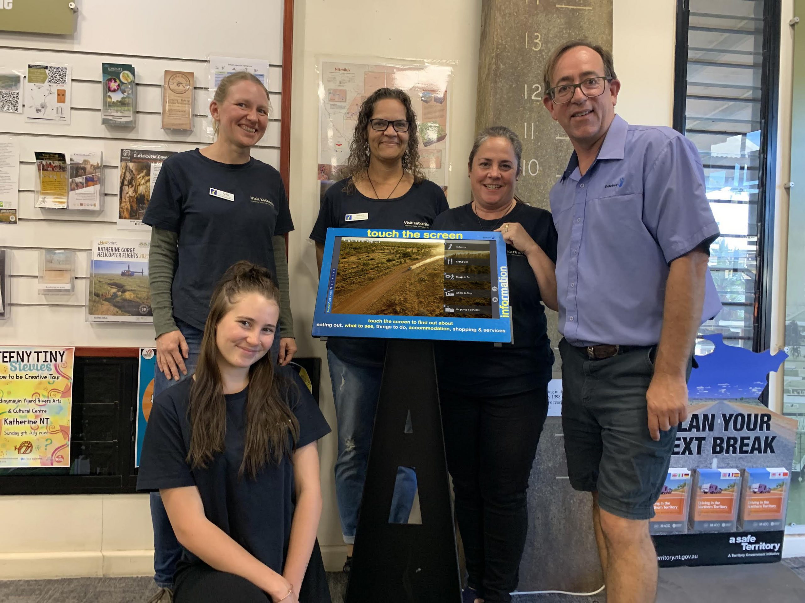 Tourism Officers (L to R) Julia Stone, Taylor Hohn, Loveena Kniger, Suzi Bowles Manager, Datatrax CEO Paul Buckley at Katherine Visitor Centre